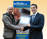 Bayt.com Choice Winner Tarek Eletrebi receiving his Certificates of Honor from Rabea Ataya CEO, Bayt.com